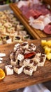 Mix of cheese on wooden plate Royalty Free Stock Photo