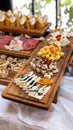 Mix of cheese on wooden plate Royalty Free Stock Photo