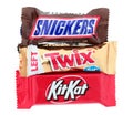 Mix of Chocolate bars in package, such as: Kit Kat, Snickers and Twix, isolated on transparent background, food and