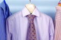 Mix color Shirt and Tie on Hangers Royalty Free Stock Photo