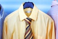 Mix color Shirt and Tie on Hangers Royalty Free Stock Photo