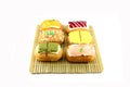 Mix color Sushi Donuts in bamboo dish. Royalty Free Stock Photo