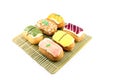 Mix color Sushi Donuts in bamboo dish. Royalty Free Stock Photo