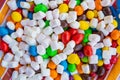 Mix of colorful Candies, delights and marshmallow on the plate. The sugar feast, any celebrations or children's party. Royalty Free Stock Photo