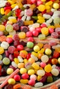 A mix of colorful candy on background, texture