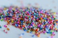 Mix of colorful seed beads, texture background Royalty Free Stock Photo