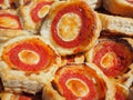 Mix of delicious appetizers and small pizzas made of puff pastry Royalty Free Stock Photo