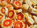 Mix of delicious appetizers and small pizzas made of puff pastry Royalty Free Stock Photo