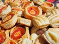 Mix of delicious appetizers and small pizzas made of puff pastry Royalty Free Stock Photo