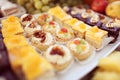 Mix of delicious small cakes Royalty Free Stock Photo