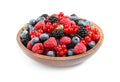 Mix of different fresh berries in bowl on background Royalty Free Stock Photo