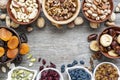 Mix of dried fruits and nuts on rustic wooden background Royalty Free Stock Photo