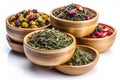 Mix of Dry Green and Flower Tea in Bamboo Bowls Royalty Free Stock Photo