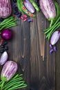 Mix of fresh farmers market vegetable from above on the old wooden board with copy space. Healthy eating background. Top view Royalty Free Stock Photo