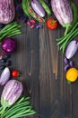 Mix of fresh farmers market vegetable from above on the old wooden board with copy space. Healthy eating background. Top view Royalty Free Stock Photo
