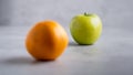 Mix of fresh fruit green apple and orange, Focused on apple. fresh fruits Royalty Free Stock Photo