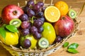 Mix of fresh fruits on wicker bascket Royalty Free Stock Photo