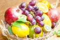 Mix of fresh fruits on wicker bascket Royalty Free Stock Photo