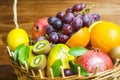 Mix of fresh fruits on wicker bascket Royalty Free Stock Photo