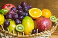 Mix of fresh fruits on wicker bascket Royalty Free Stock Photo