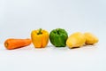 Mix Fruits for Healthy Eating, Carrot, Bell Pepper and Mangos with Water Drop on Isolated White Background