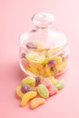 Mix of fruity jelly candy on pink background