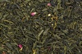 Mix green tea with petals of marigold and rose petals. Royalty Free Stock Photo