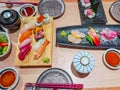 Mix of Japanese food sushi and rolls on restaurant table in restaurant in Central, Hong Kong Royalty Free Stock Photo