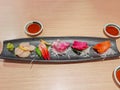 Mix of Japanese food sushi and rolls on restaurant table in restaurant in Central, Hong Kong Royalty Free Stock Photo