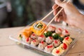 Mix japanese sushi rolls in take away package Royalty Free Stock Photo
