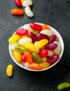 A mix of jelly beans candy in white bowl. sweet food Royalty Free Stock Photo