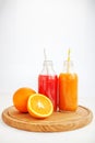 Mix juice. The glass bottle. White background. The concept of be Royalty Free Stock Photo