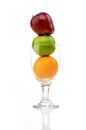 Mix of juicy fruits in wine glass