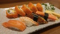 Mix maki sushi dish with fresh fish shashimi, Japanese food