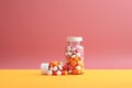 Mix of medical capsules in on minimal background. Pharmaceutical medicine pills pink, yellow and white colors. Banner Royalty Free Stock Photo