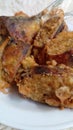 Otak otak bandeng. Take the milkfish meat, then mix the meat with the spices then put the meat back into the fish skin.