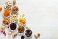 Mix of nuts and dried fruits in small bowls. Healthy and tasty snack Royalty Free Stock Photo