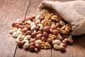 Mix of nuts on wooden table Royalty Free Stock Photo