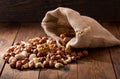 Mix of nuts on wooden table Royalty Free Stock Photo