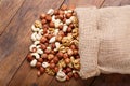 Mix of nuts on wooden table Royalty Free Stock Photo