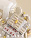 Mix of pills and capsules in a used plastic blisters close up. Taking dietary supplements