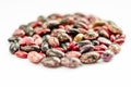 Mix of raw beans on white background. Assortment of multi colored dried kidney beans