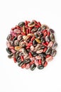 Mix of raw beans on white background. Top view of assortment of multi colored dried kidney beans