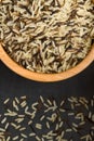 Mix of rice in a wooden bowl on a black background Royalty Free Stock Photo