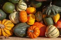 Mix of ripe green, orange, yellow pumpkins, squash and gourds with different varieties and shapes from the fresh harvest Royalty Free Stock Photo