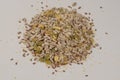 Mix of seeds for a salad. A pile of mixed seeds isolated on white background