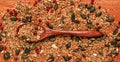 Mix Of seeds and seasonings for salad: pumpkin seeds, rosemary, chia are scattered on a wooden board Royalty Free Stock Photo