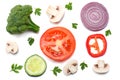 Mix of slice of tomato, red onion, parsley, mushroom and broccoli isolated on white background. Top view Royalty Free Stock Photo