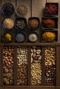 Mix of spices and mix of nuts on a wooden surface Royalty Free Stock Photo