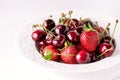 Mix of Strawberries and Cherry in White Plate Beautiful Ripe Juicy Strawberry and Cherry Close Up Royalty Free Stock Photo